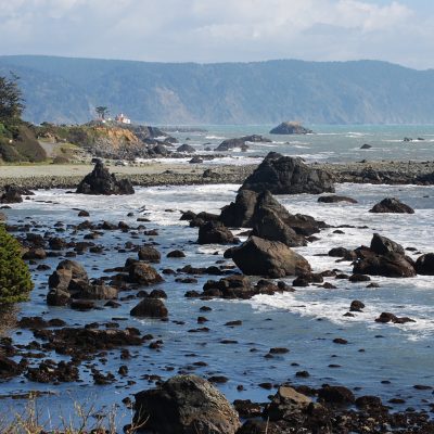 Pacific ocean waves crash over rocks at Crescent City, California